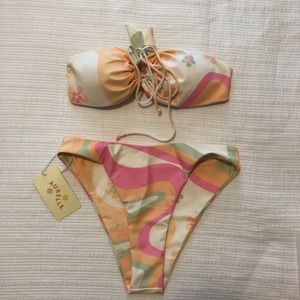NWT! Aurelle Donna Bikini Set. Top size medium. Bottoms size small.